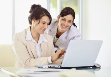 Women looking at computer